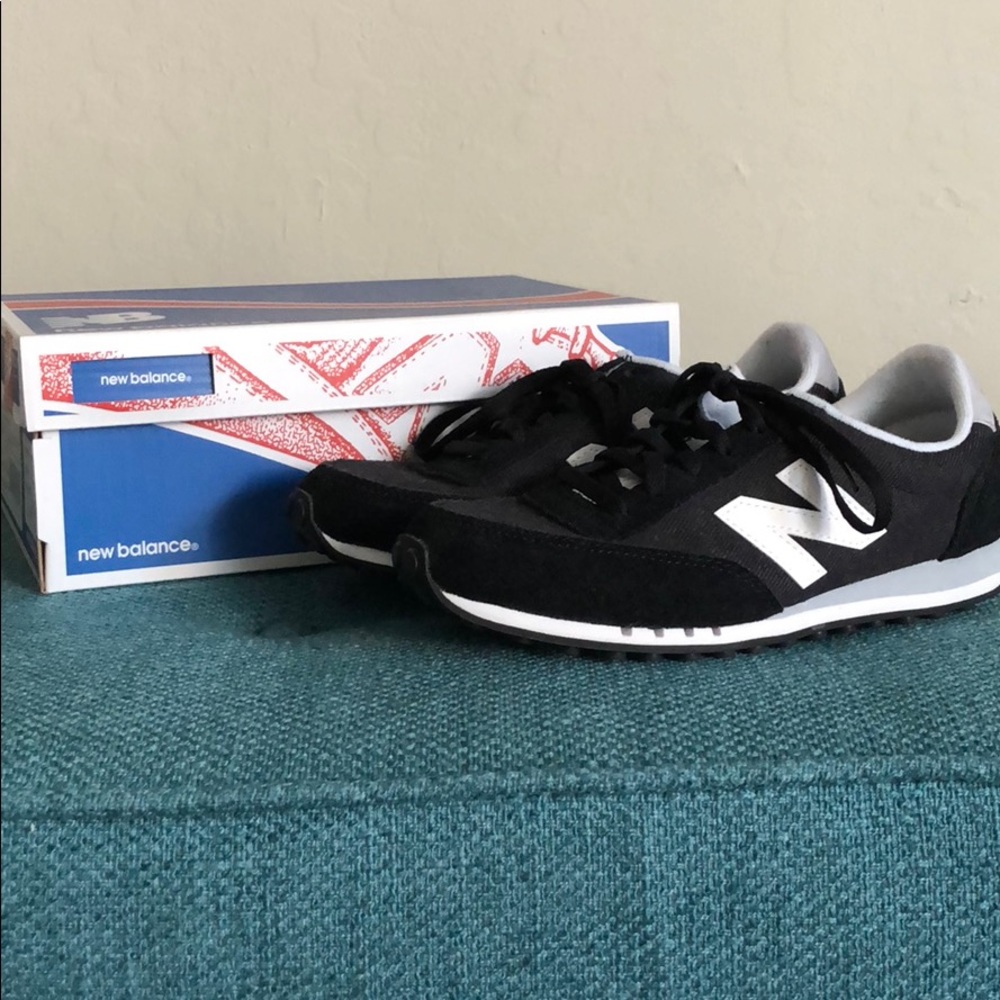 Black and white New Balance sneakers